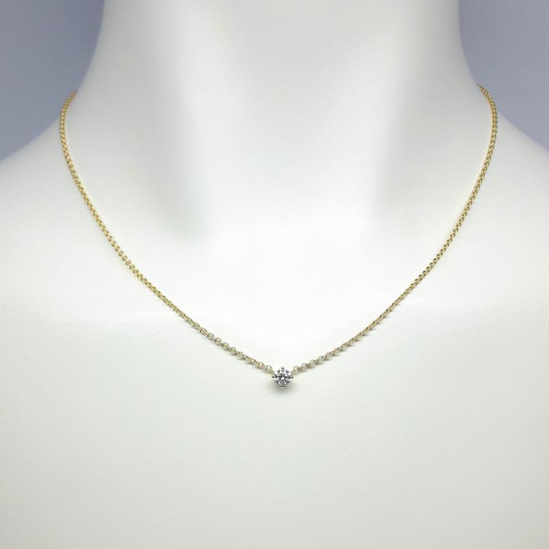 1 collier en or jaune 18kt et diamant 0,25ct.