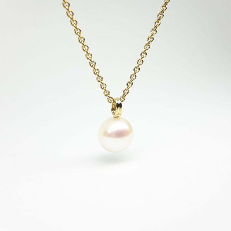 Pendentif en or jaune 18kt et perle d'eau douce blanche Ø11,2mm.